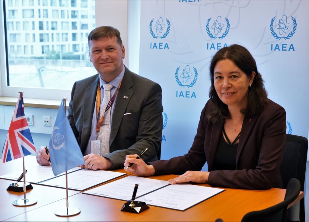 Representatives of IAEA and NTS signing a nuclear security agreement at the IAEA' headquarters in Vienna